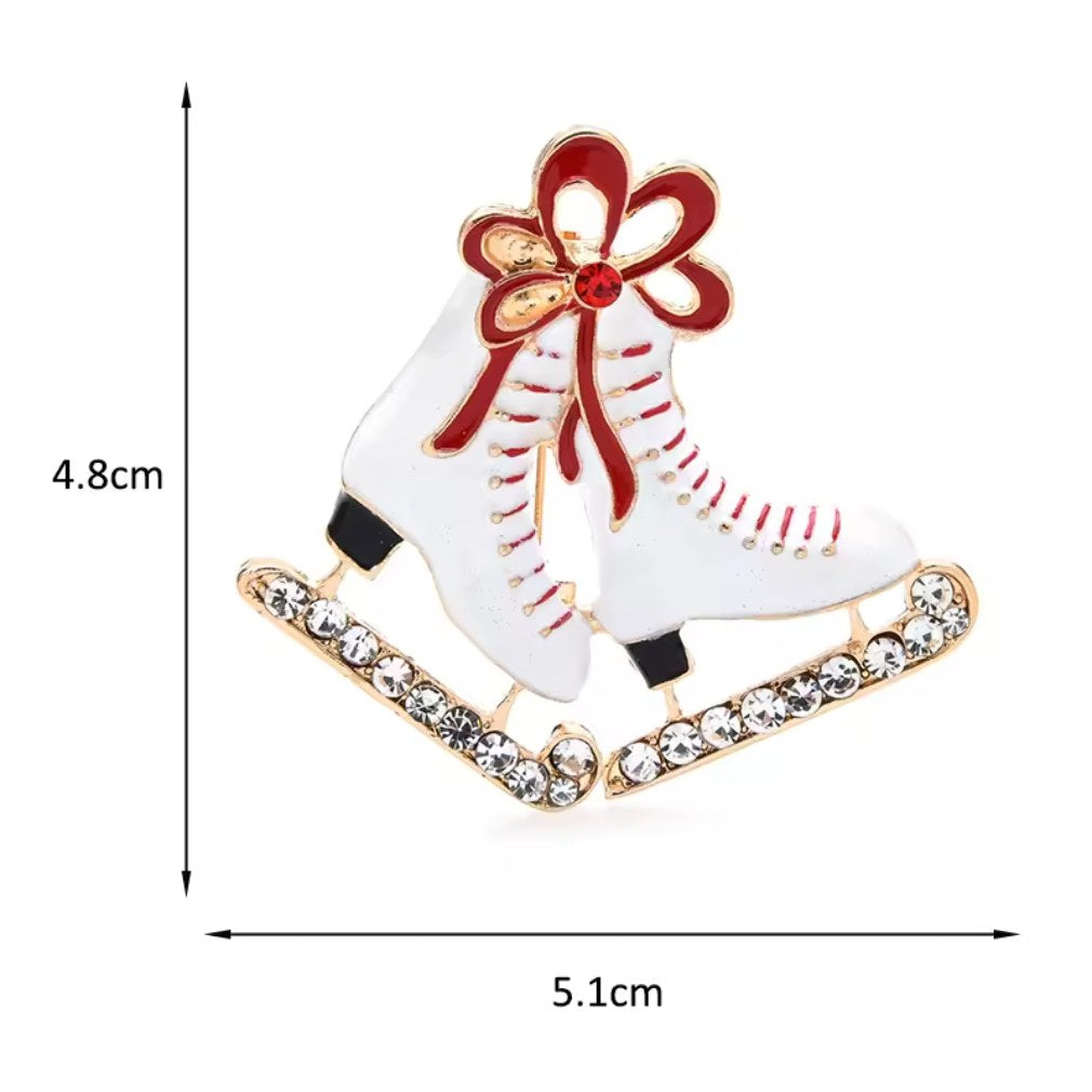 Romantische Schlittschuh-Brosche mit roter Schleife und Strass