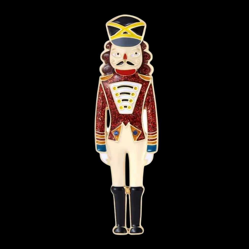 Brosche zur Weihnachtszeit kleiner Nussknacker emailliert