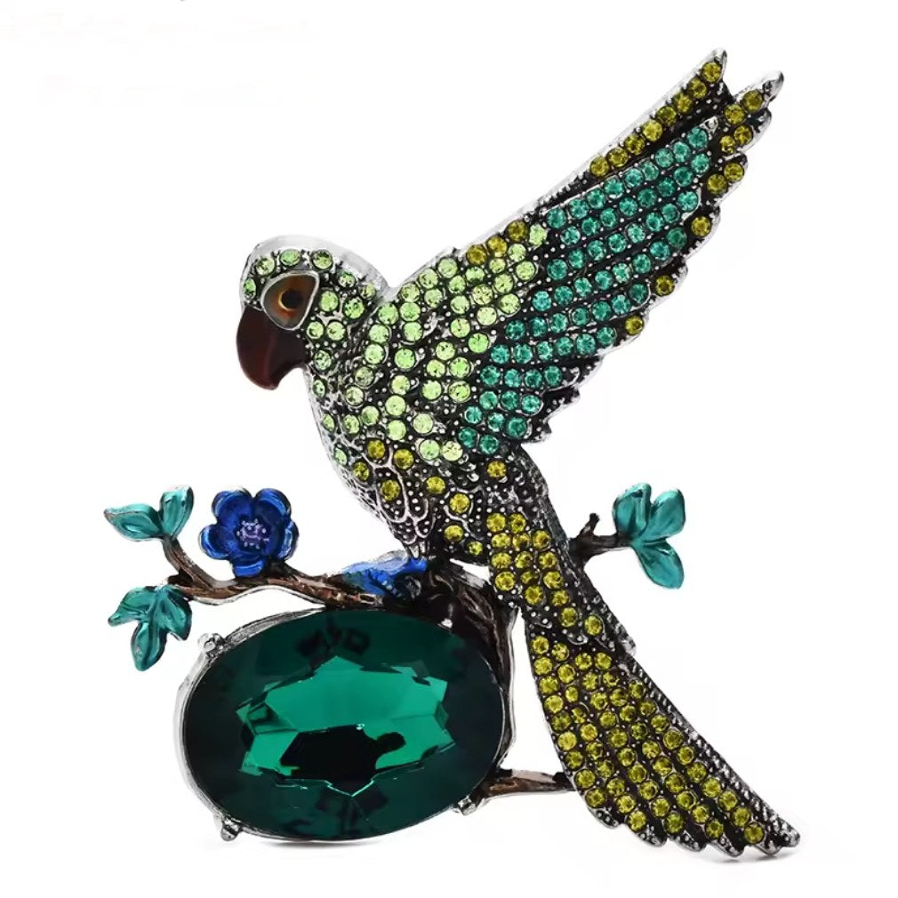 Vintage Look Brosche Vogel auf Ast in grün mit Strass