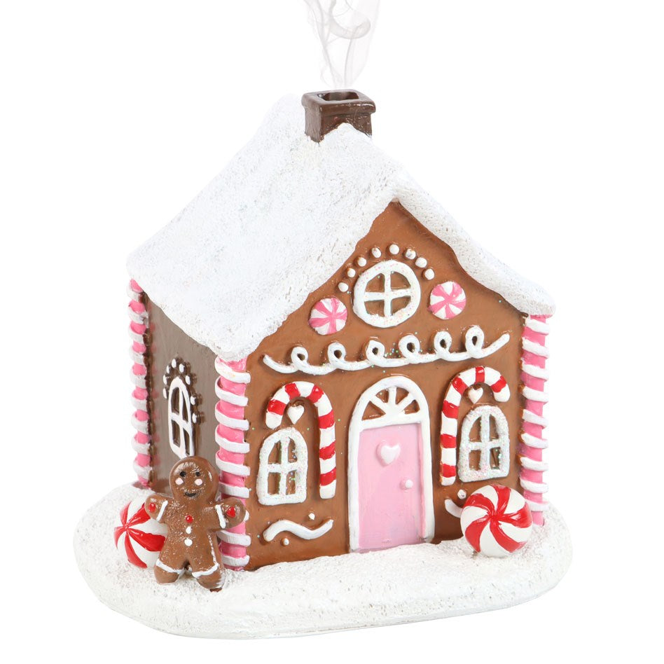 Süßes rosa Lebkuchenhaus als Räucherkegelbrenner