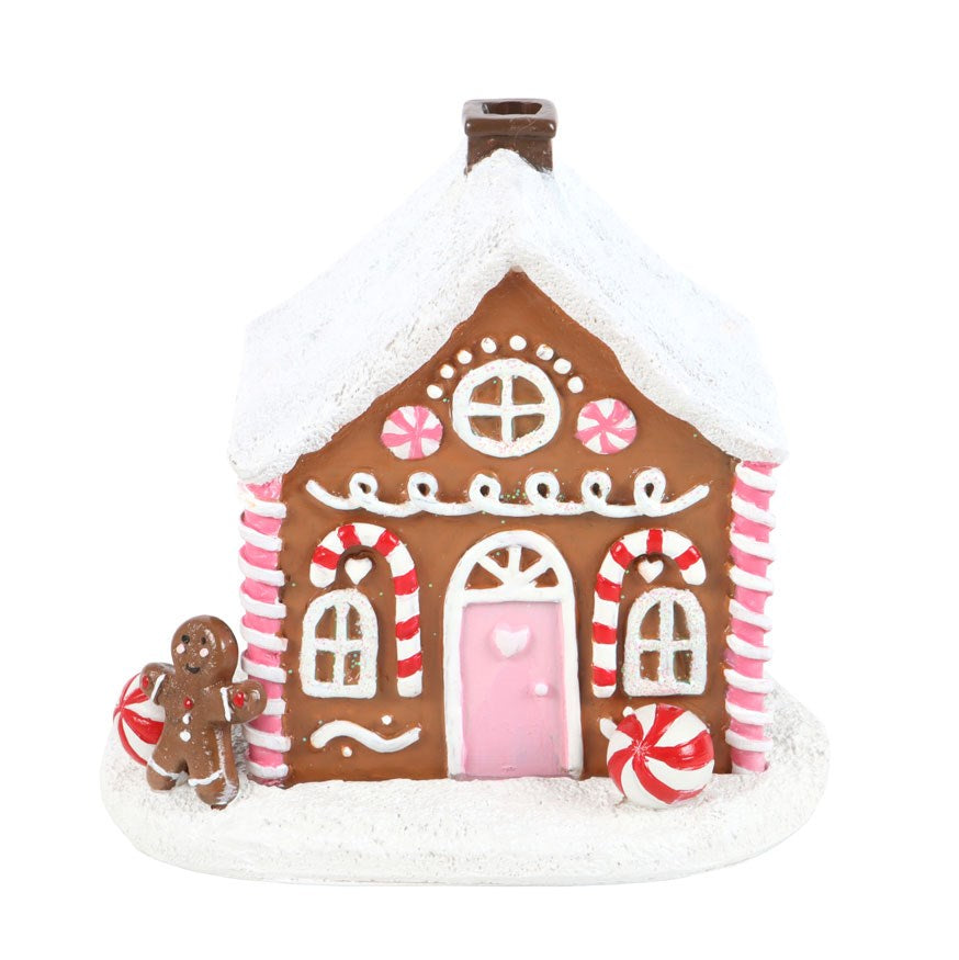 Süßes rosa Lebkuchenhaus als Räucherkegelbrenner