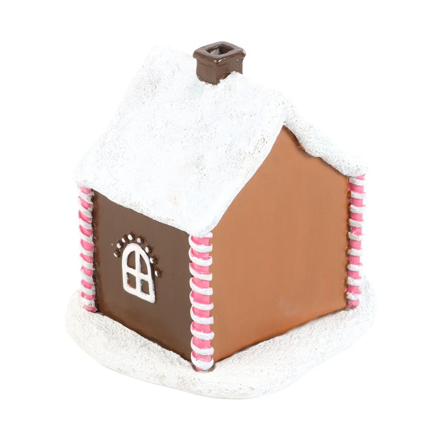 Süßes rosa Lebkuchenhaus als Räucherkegelbrenner