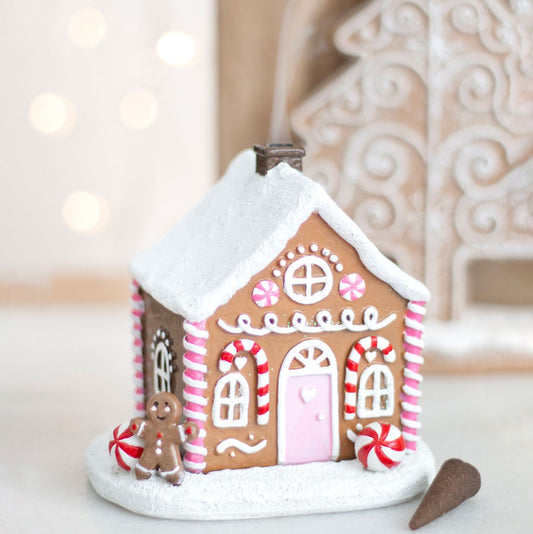 Süßes rosa Lebkuchenhaus als Räucherkegelbrenner