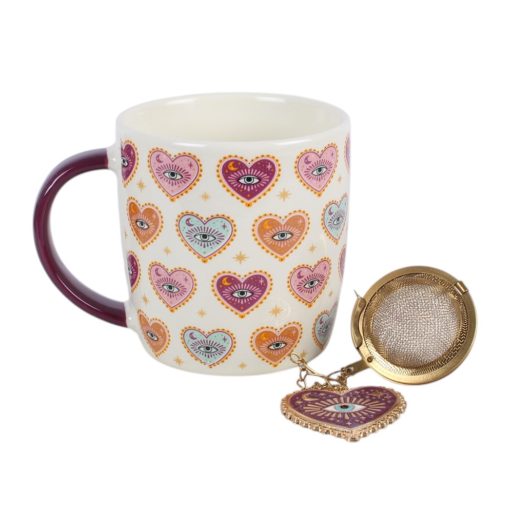 Tasse mit Herz-Augen-Motiv und Teesieb mit Herzanhänger