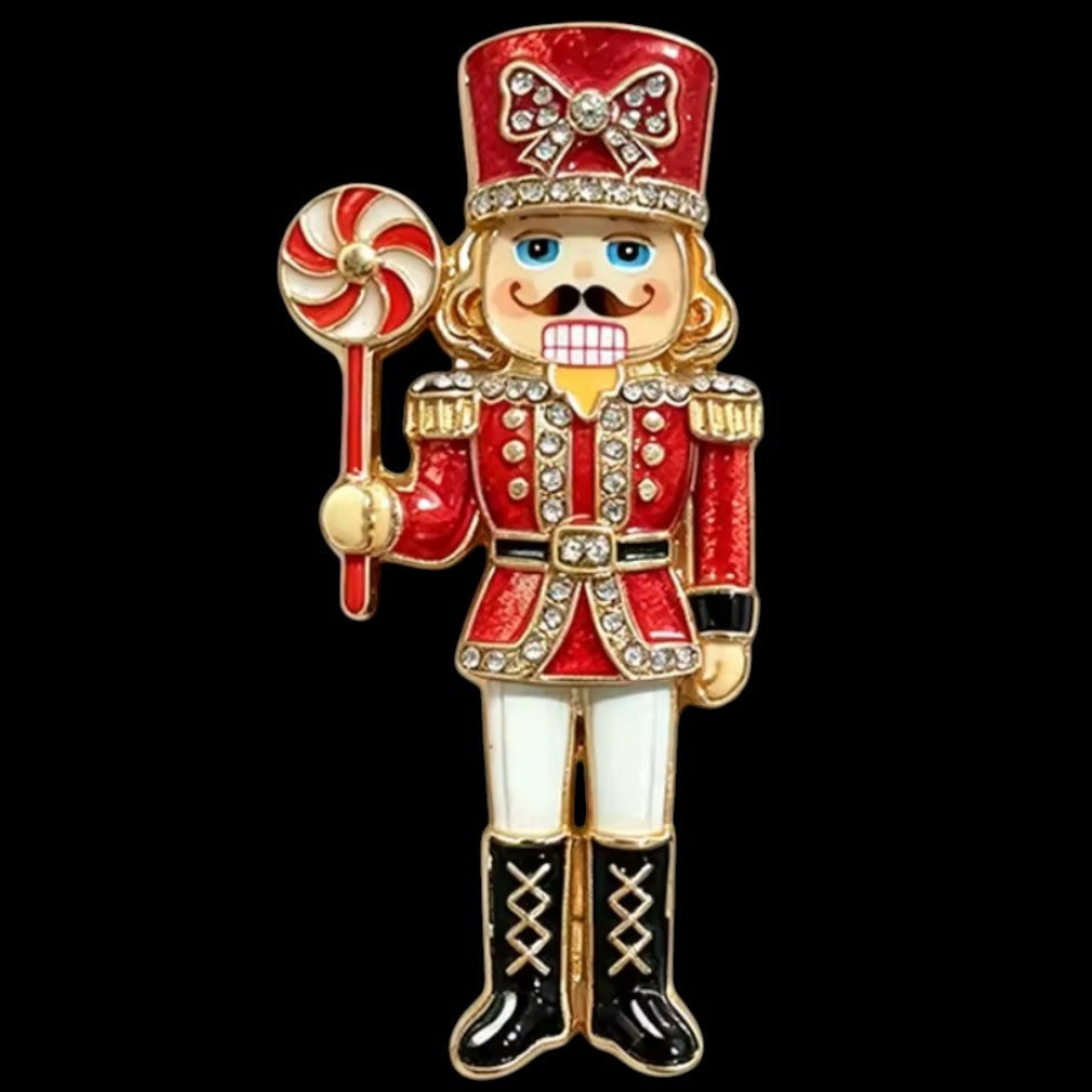 Weihnachtsbrosche Nussknacker-Soldat mit Lolli – schwarzer Hintergrund