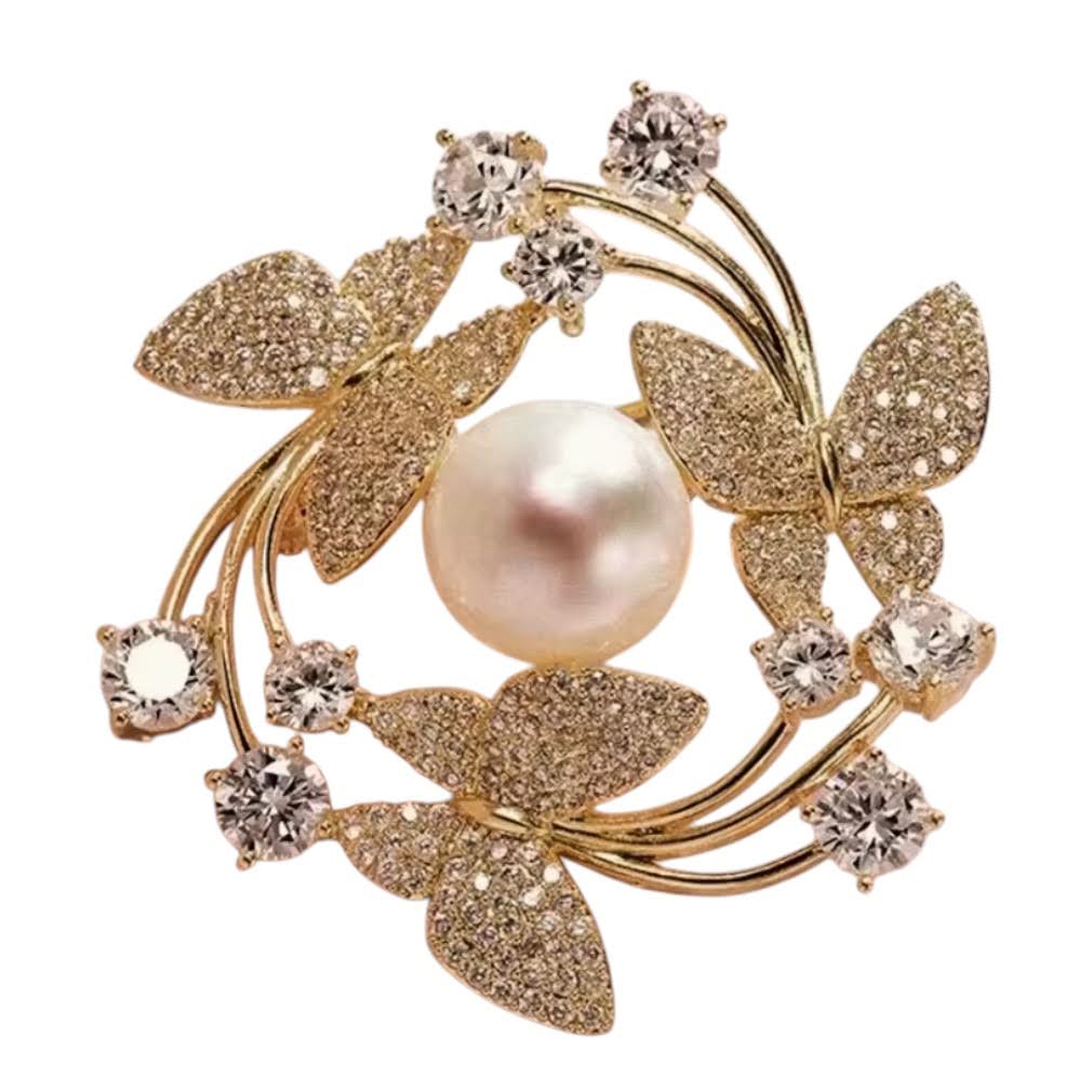 Schmetterlings-Brosche Gold mit Perle und Zirkonia auf weißem Hintergrund
