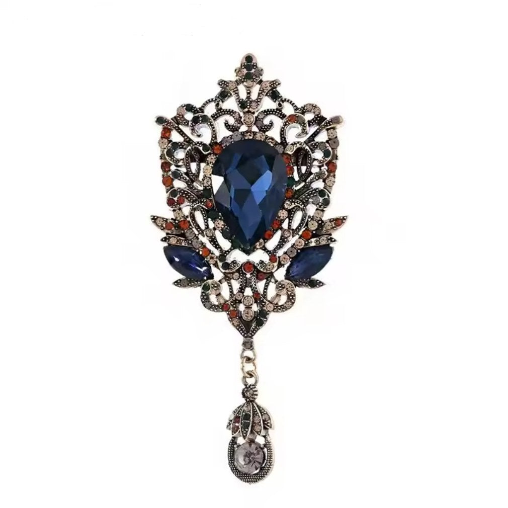 Vintage Brosche mit blauem Kristall und Anhänger