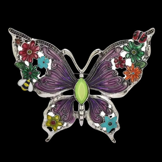 Vintage Schmetterlingsbrosche Violett mit Blumen und Emaille